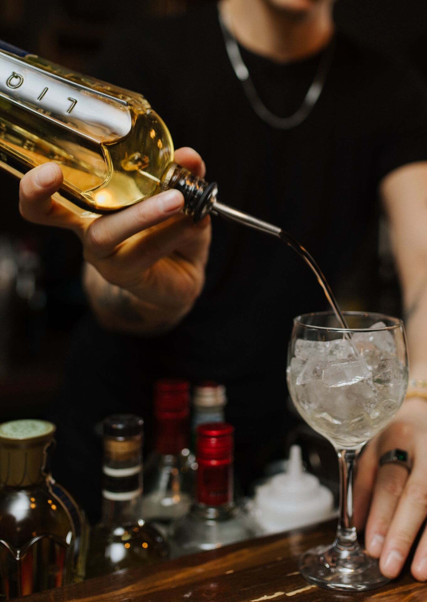 Signature cocktail being poured